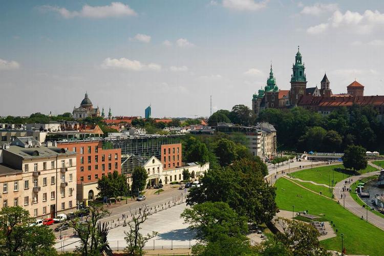 Krakow with Auschwitz Tour A luxurious & prestigious hotel located at the foot of The Royal Wawel Castle, next to the river